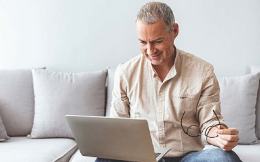 man using laptop